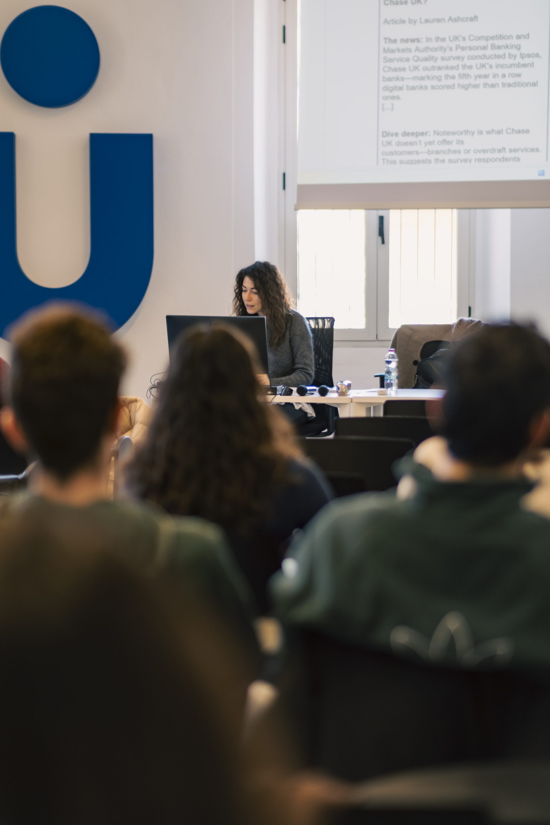 A faculty member delivering a lecture at Unicollege