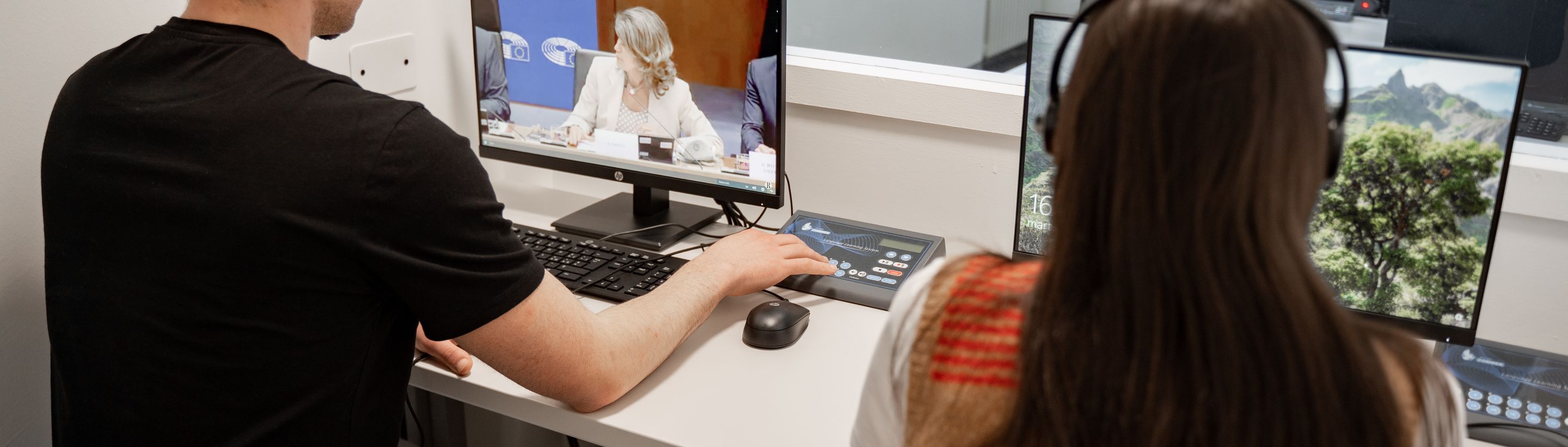 A student following an online class at a Unicollege workstation