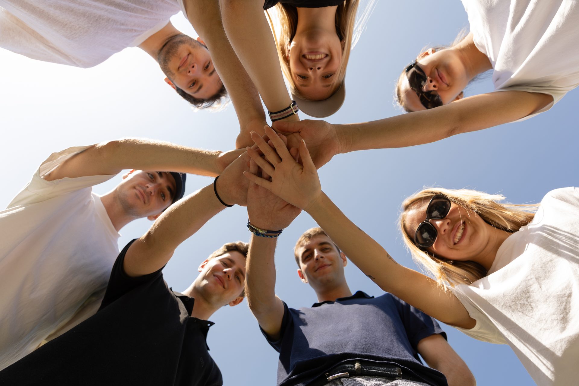 Students joining hands at Unicollege