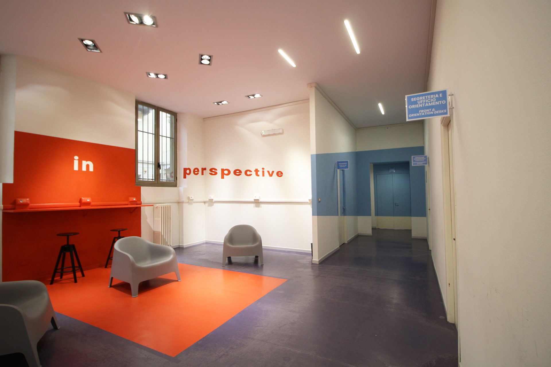 Student lounge at the Unicollege Turin City College, with its "in perspective" wall graphics