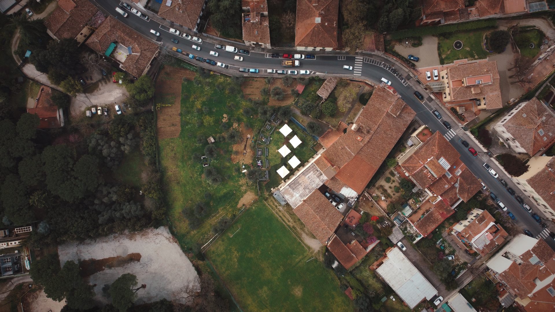 The Unicollege Florence campus and its gardens along Via Bolognese, seen from above